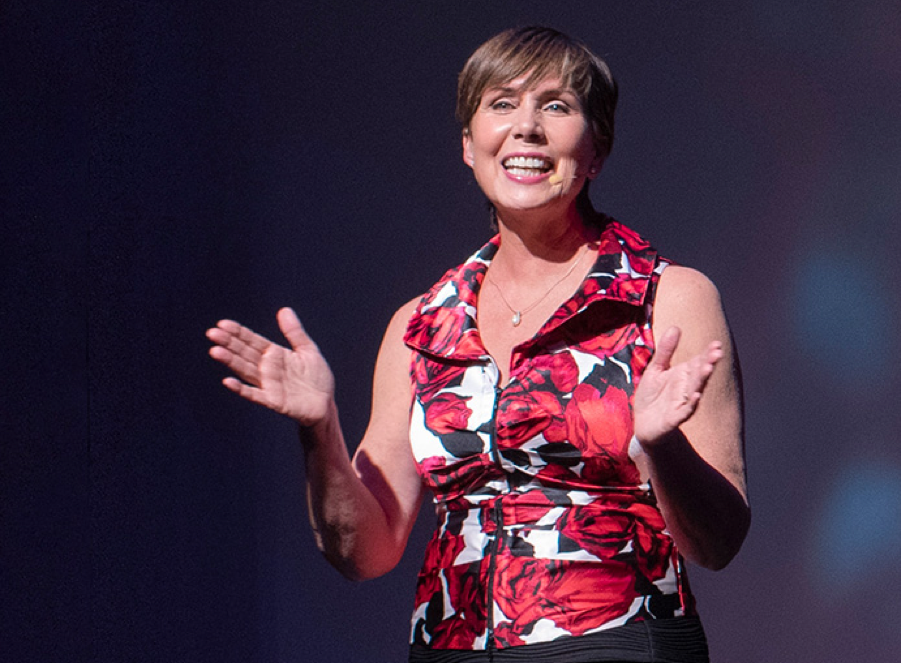 Cara Hale Alter presenting on stage