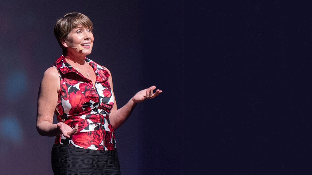 Cara Hale Alter delivering a keynote